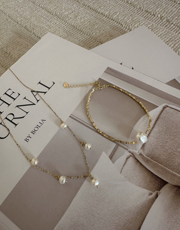 Armbånd i et elegant look med ferskvandsperle.