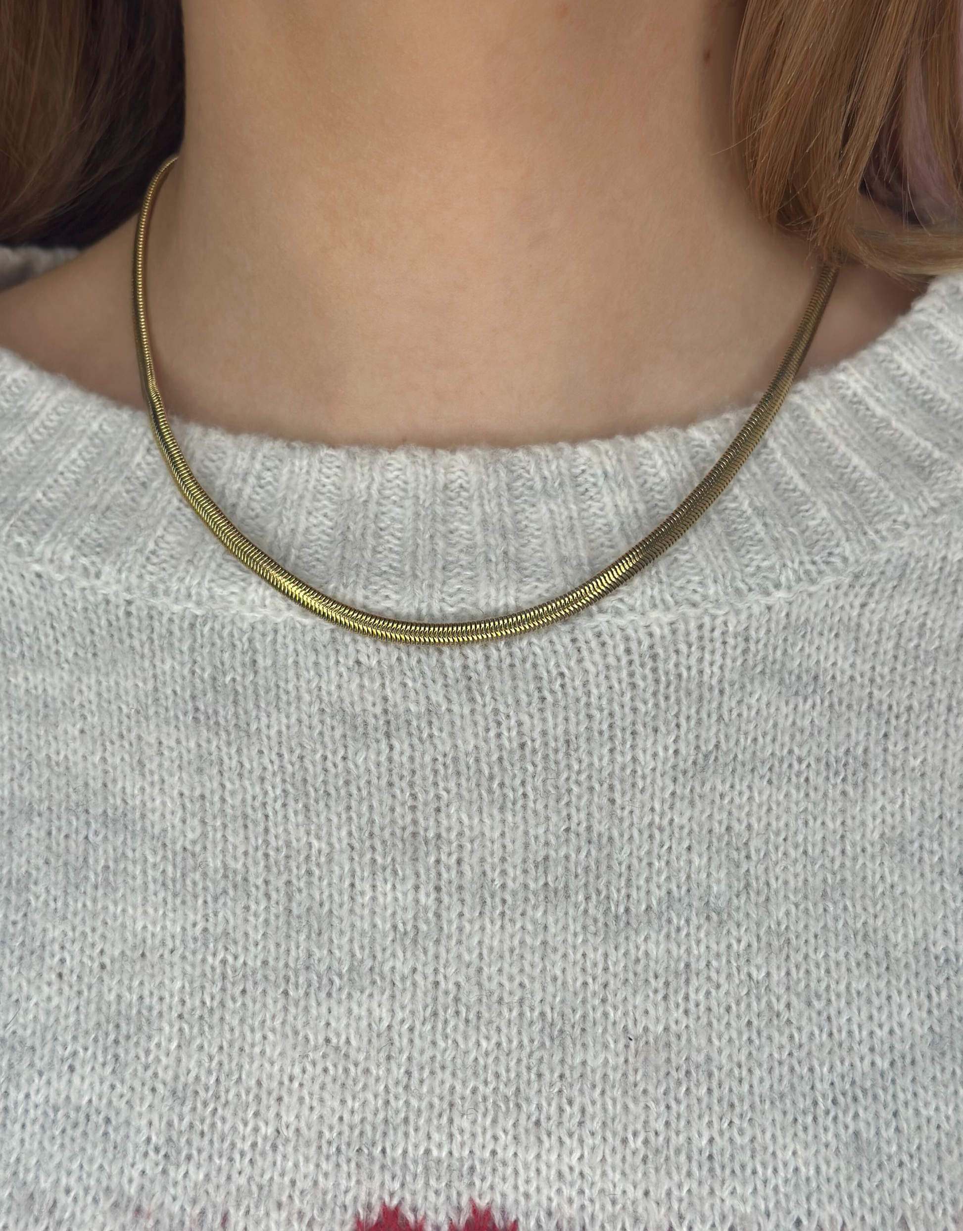 Smuk guld slange halskæde.