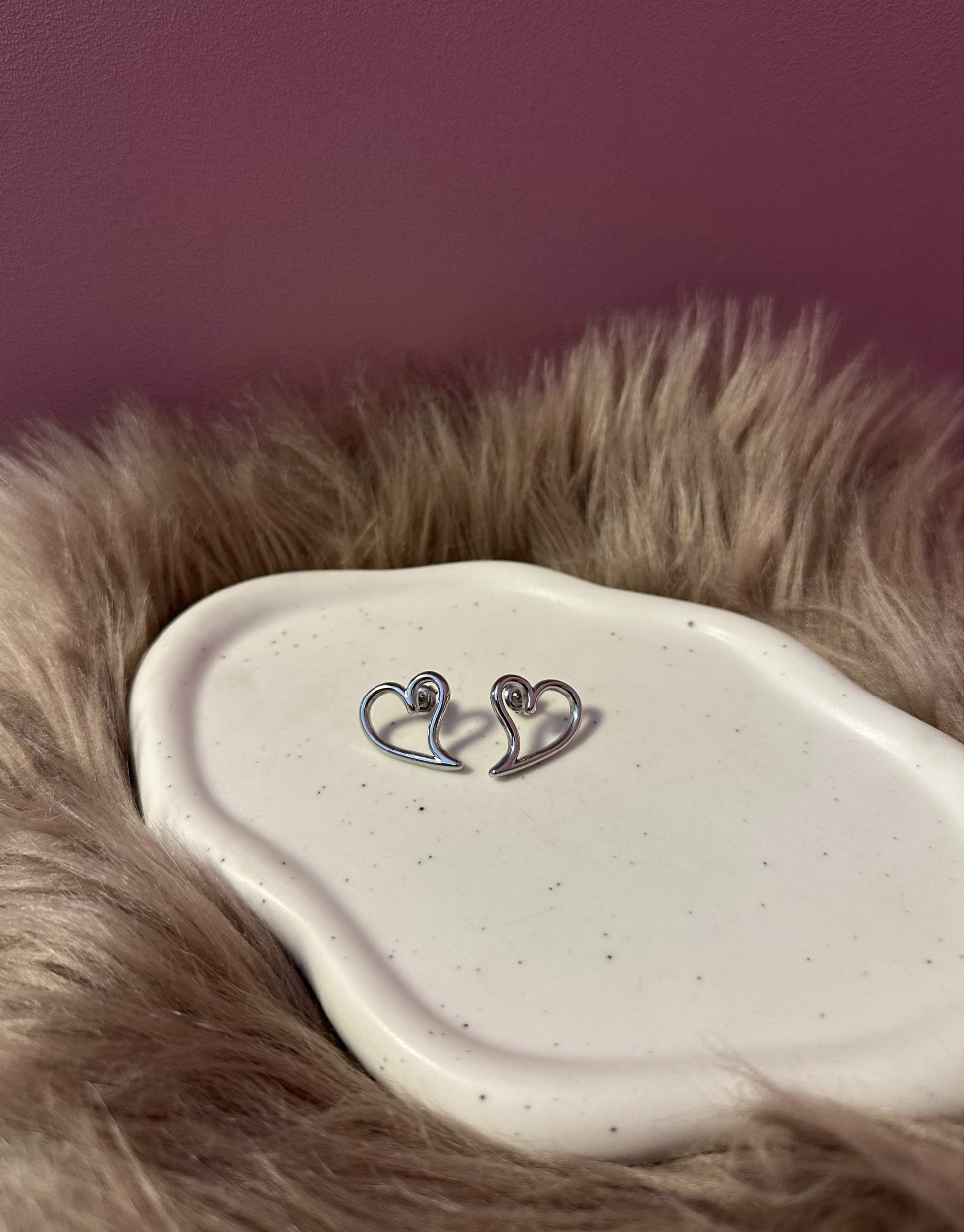 Elegante ørestikkere i hjerte motiv